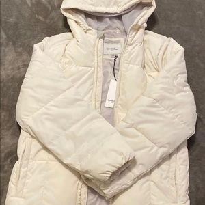 White/cream puffer coat